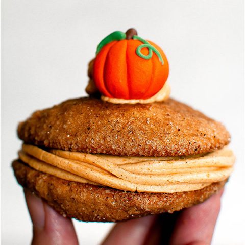 Pumpkin whoopie pies with pumpkin buttercream.