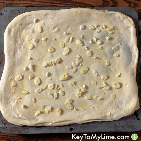 Pizza dough with olive oil and garlic.