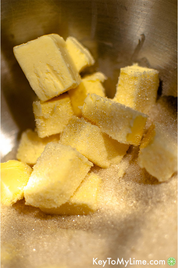 Sugar and butter in mixing bowl.