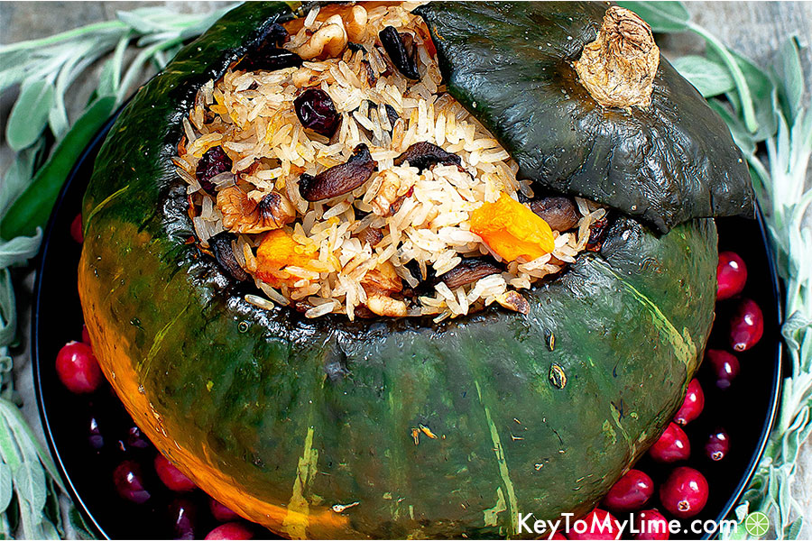 Roasted kabocha squash stuffed with rice, mushrooms, cranberries, and sage.