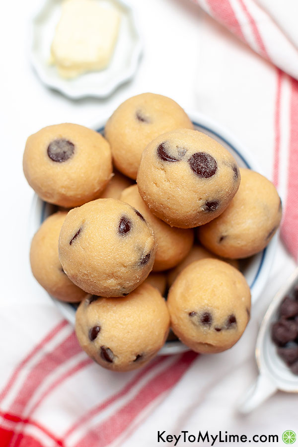 Keto chocolate chip cookie dough balls in a small bowl.