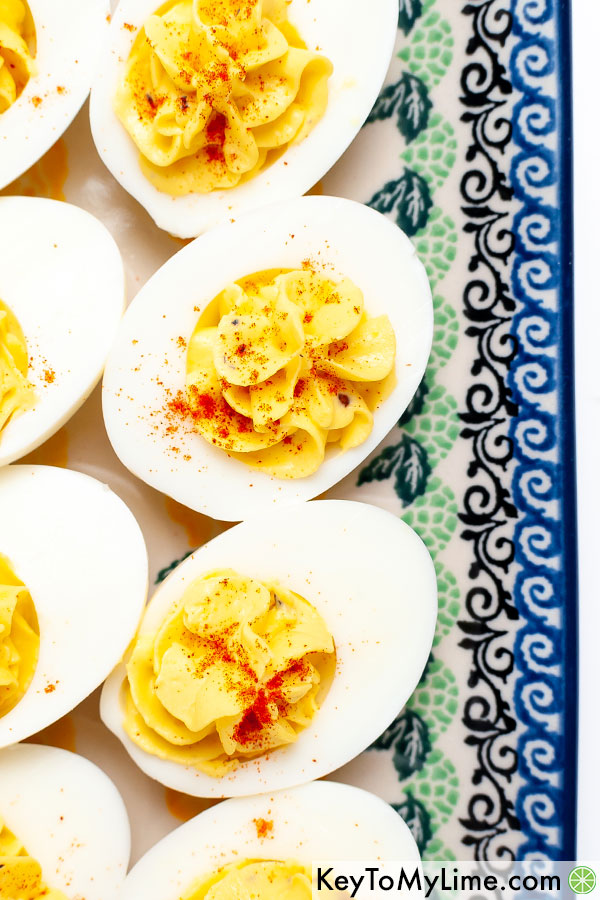 A close up overhead image of deviled eggs.