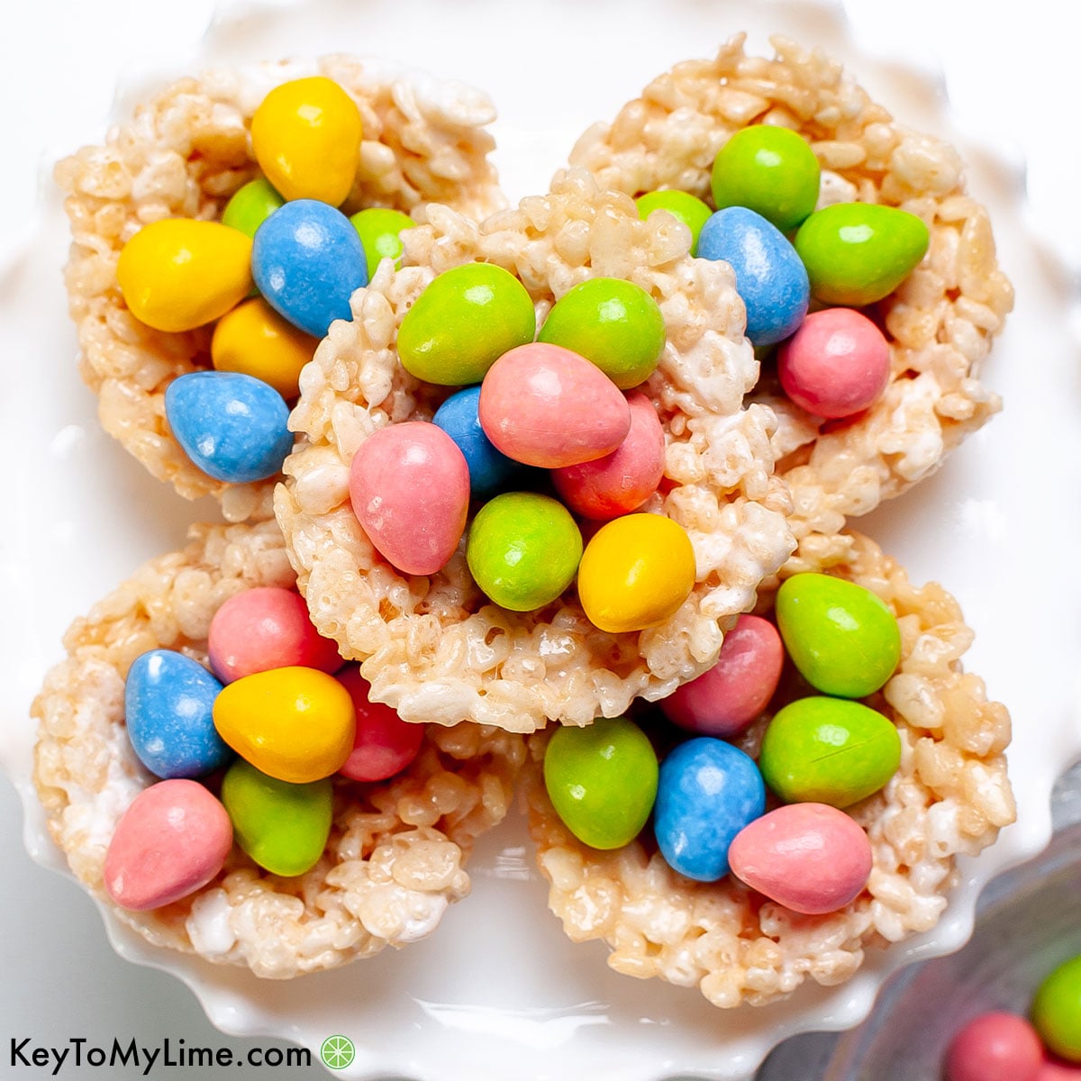 A stack of the best ever Rice Krispie Nests recipe with candy eggs.