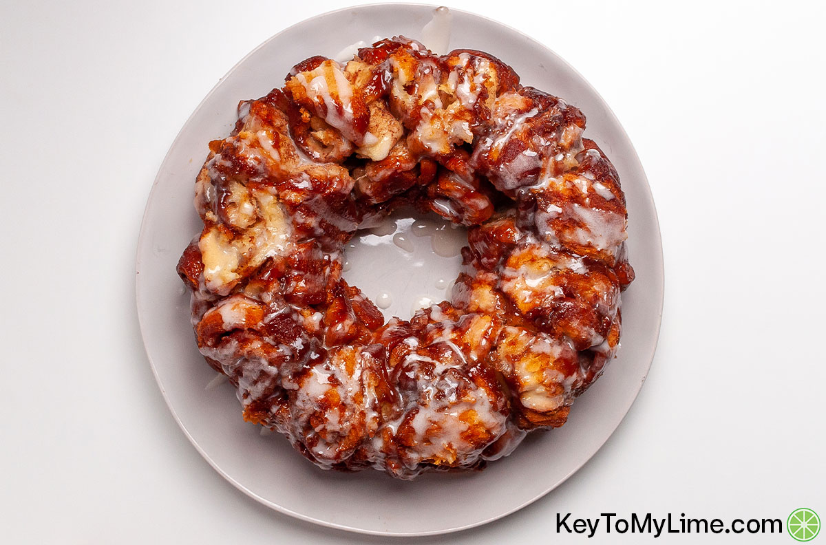 The best cinnamon roll monkey bread on a large white plate.