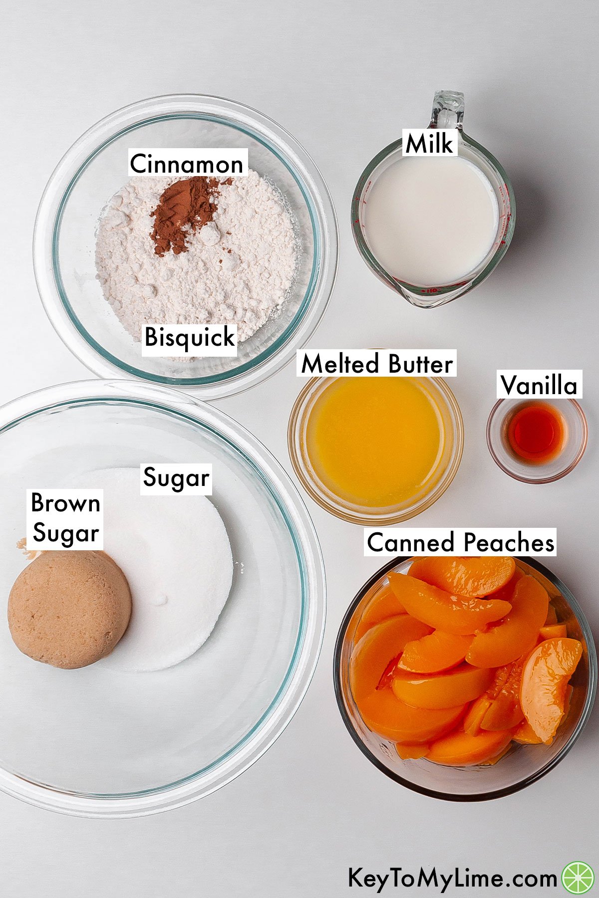 The labeled ingredients for Bisquick peach cobbler.