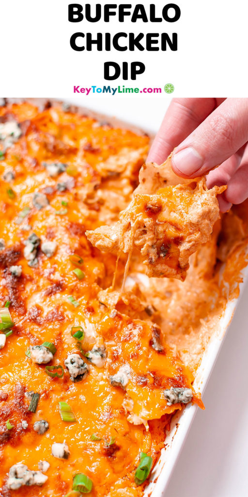 A Pinterest pin image of Buffalo chicken dip, with title text at the top.