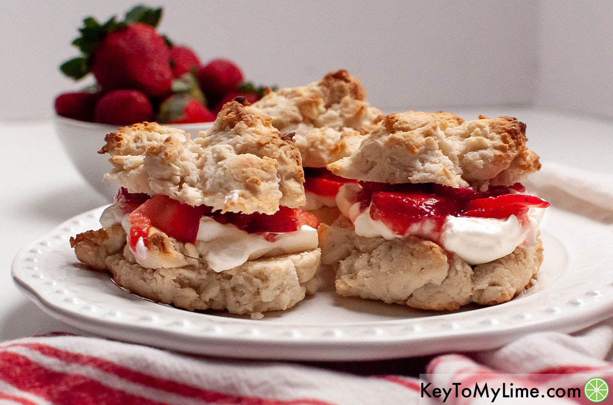 Three Bisquick strawberry shortcakes on a white plate.