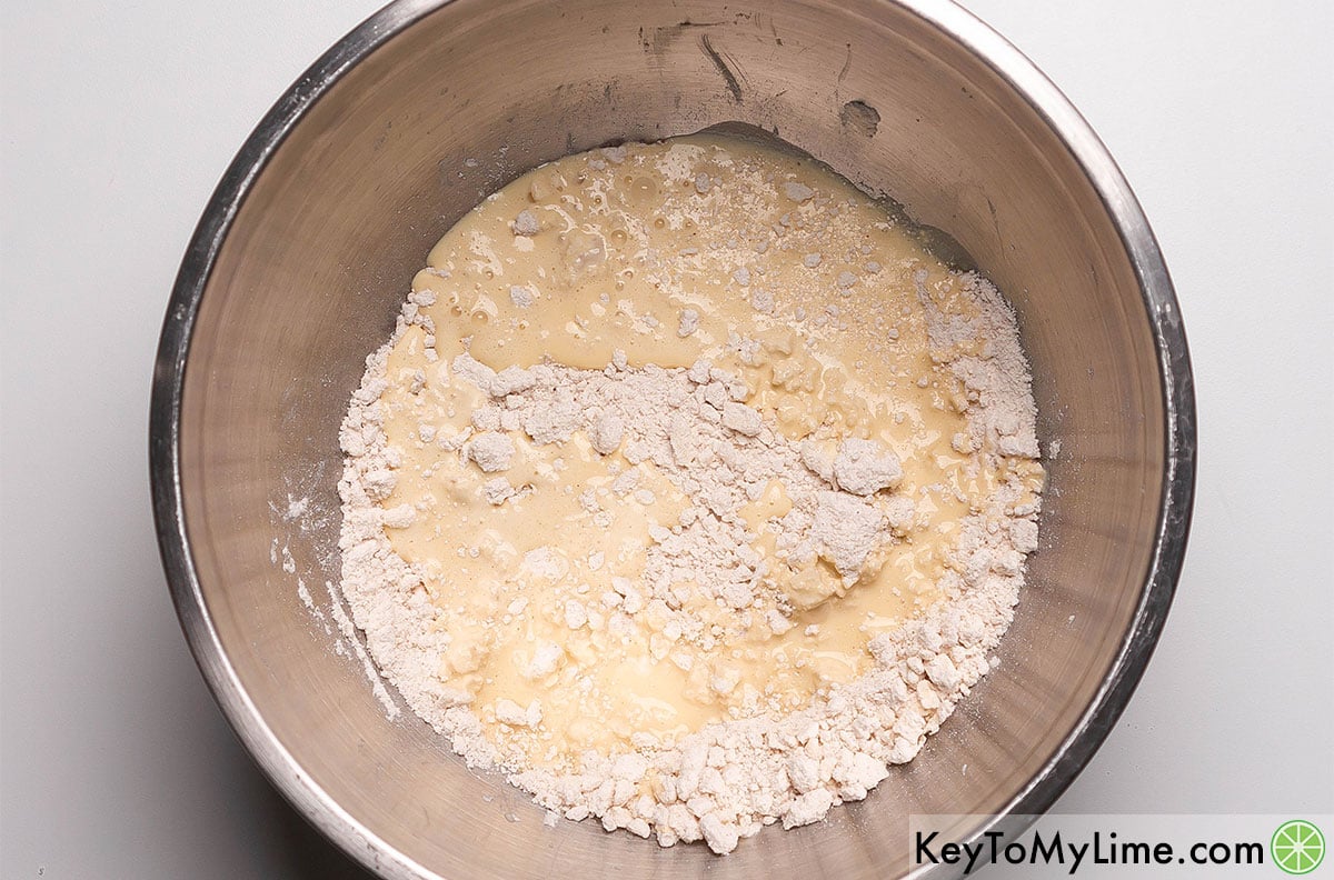 Mixing together the wet and dry scone ingredients.