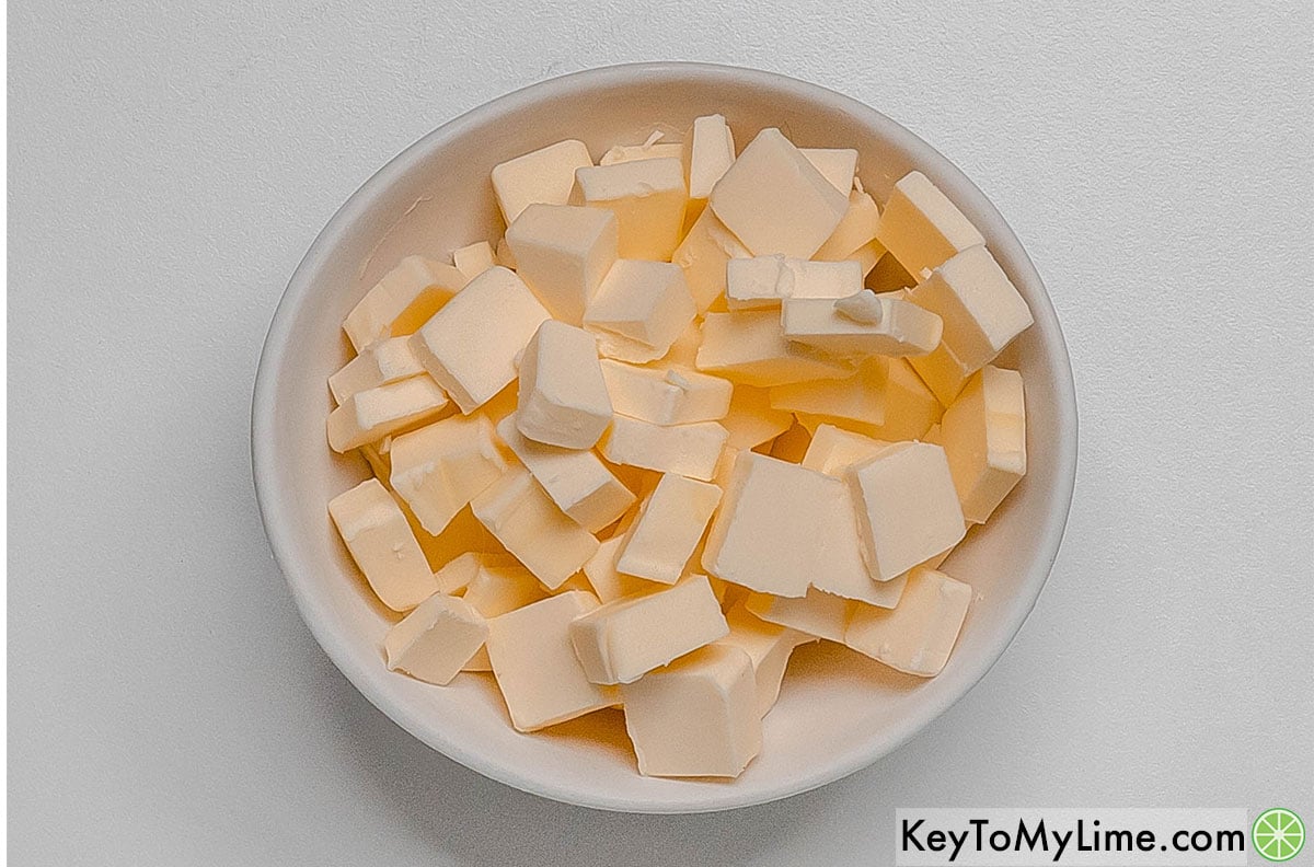 Cutting the cold butter into smaller pieces then placing in the fridge to chill.