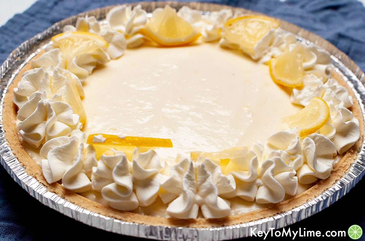 A side image of the lemon pie showing the whipped cream peaks on top of the pie.