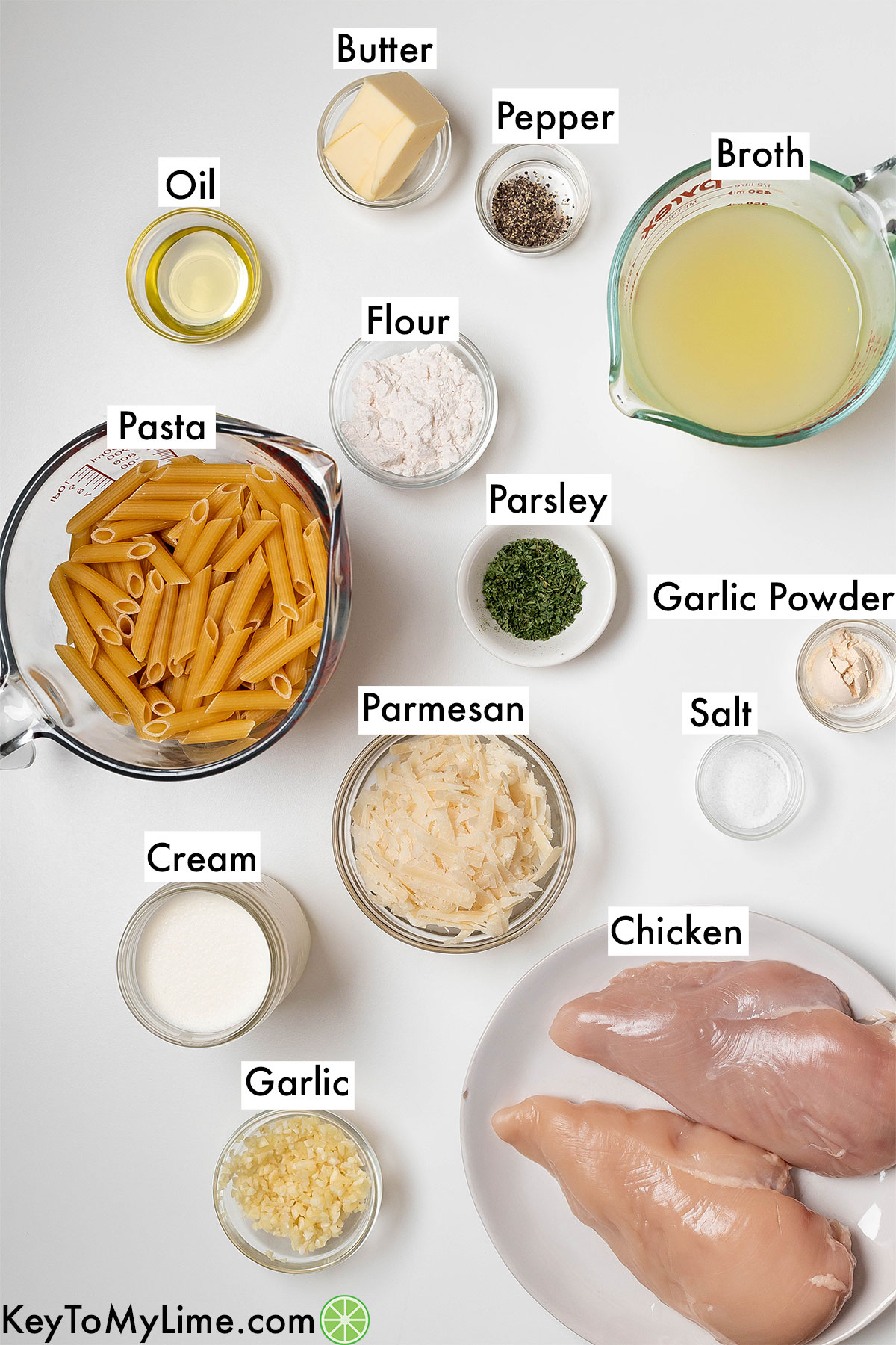 The labeled ingredients for creamy garlic chicken pasta.