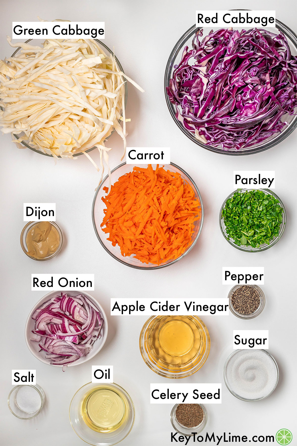 The labeled ingredients for vinegar coleslaw.
