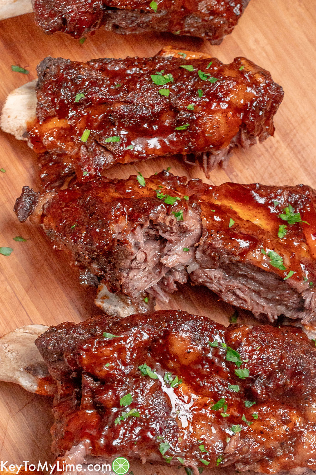 A close up image showing the texture of the saucy ribs.