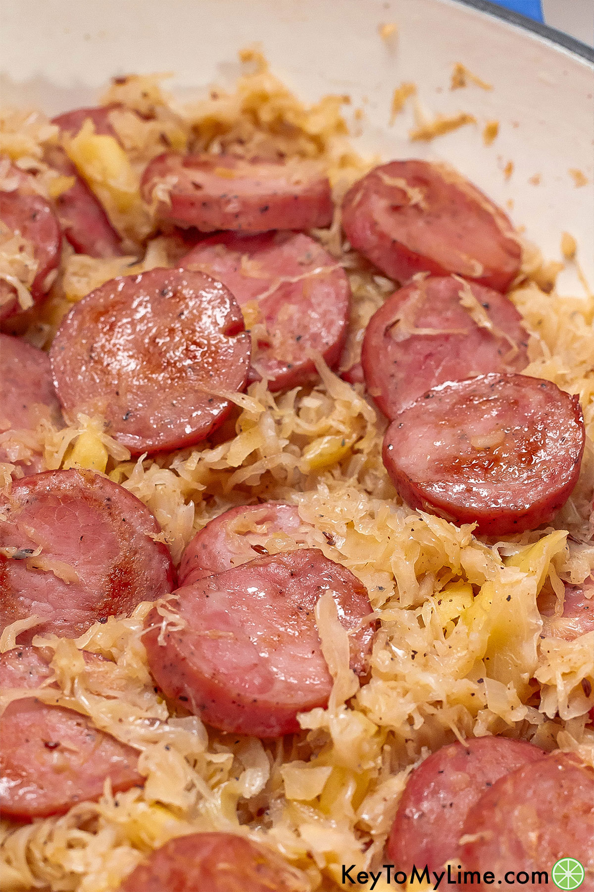 A close up image showing the texture of the cooked kielbasa rounds.