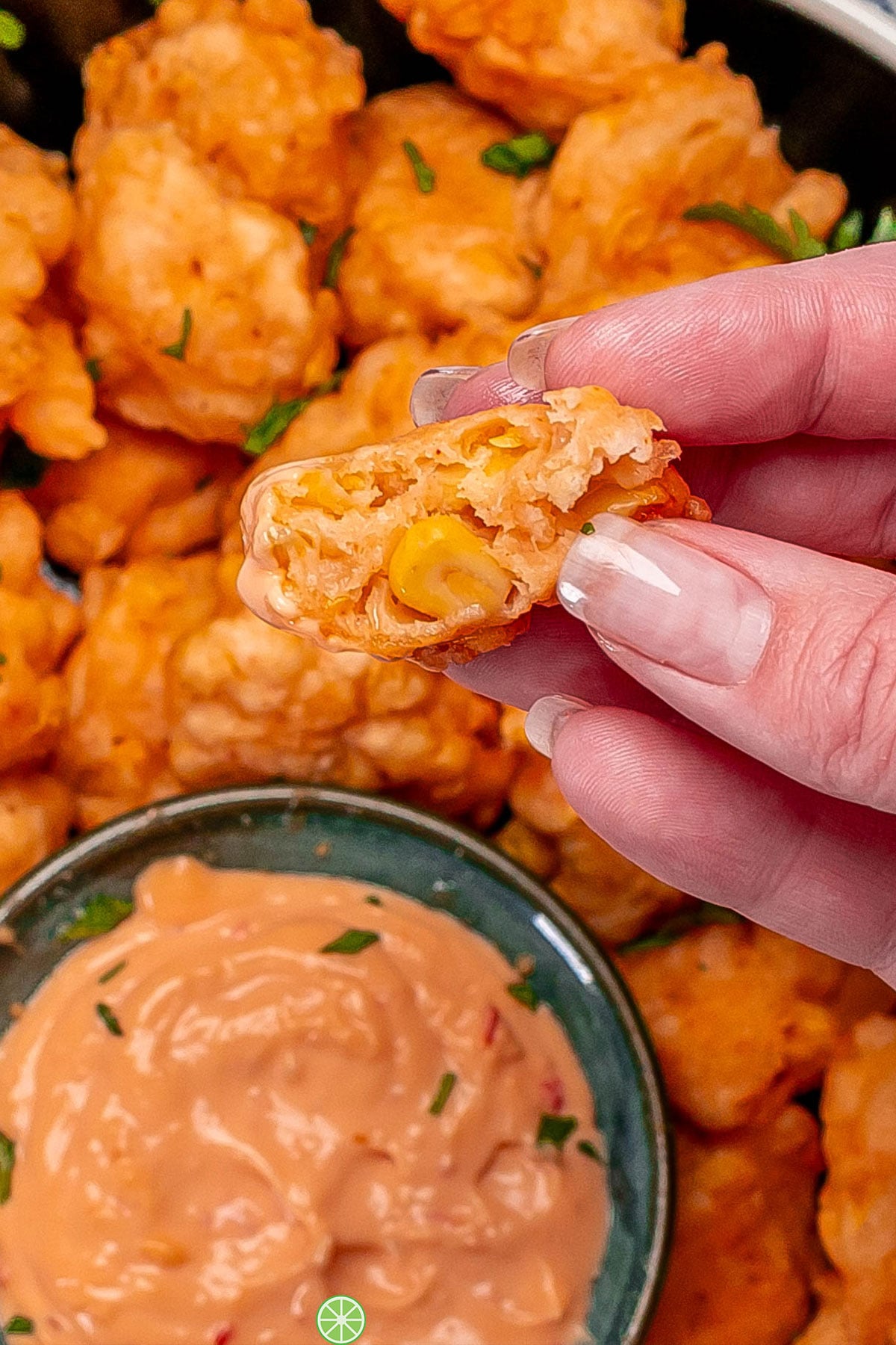 A close up image showing the batter texture of a corn nugget.