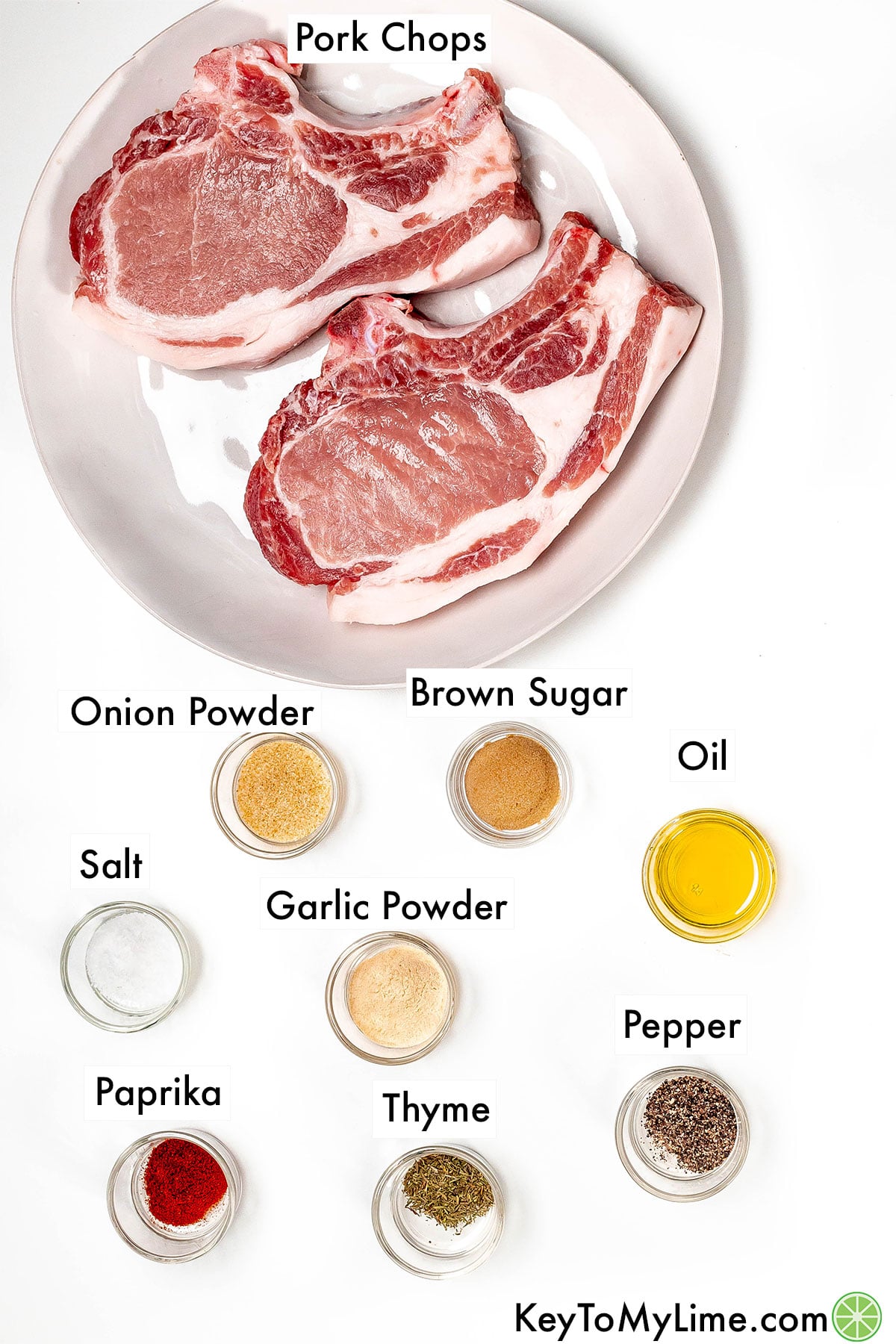The labeled ingredients for air fryer bone in pork chops.