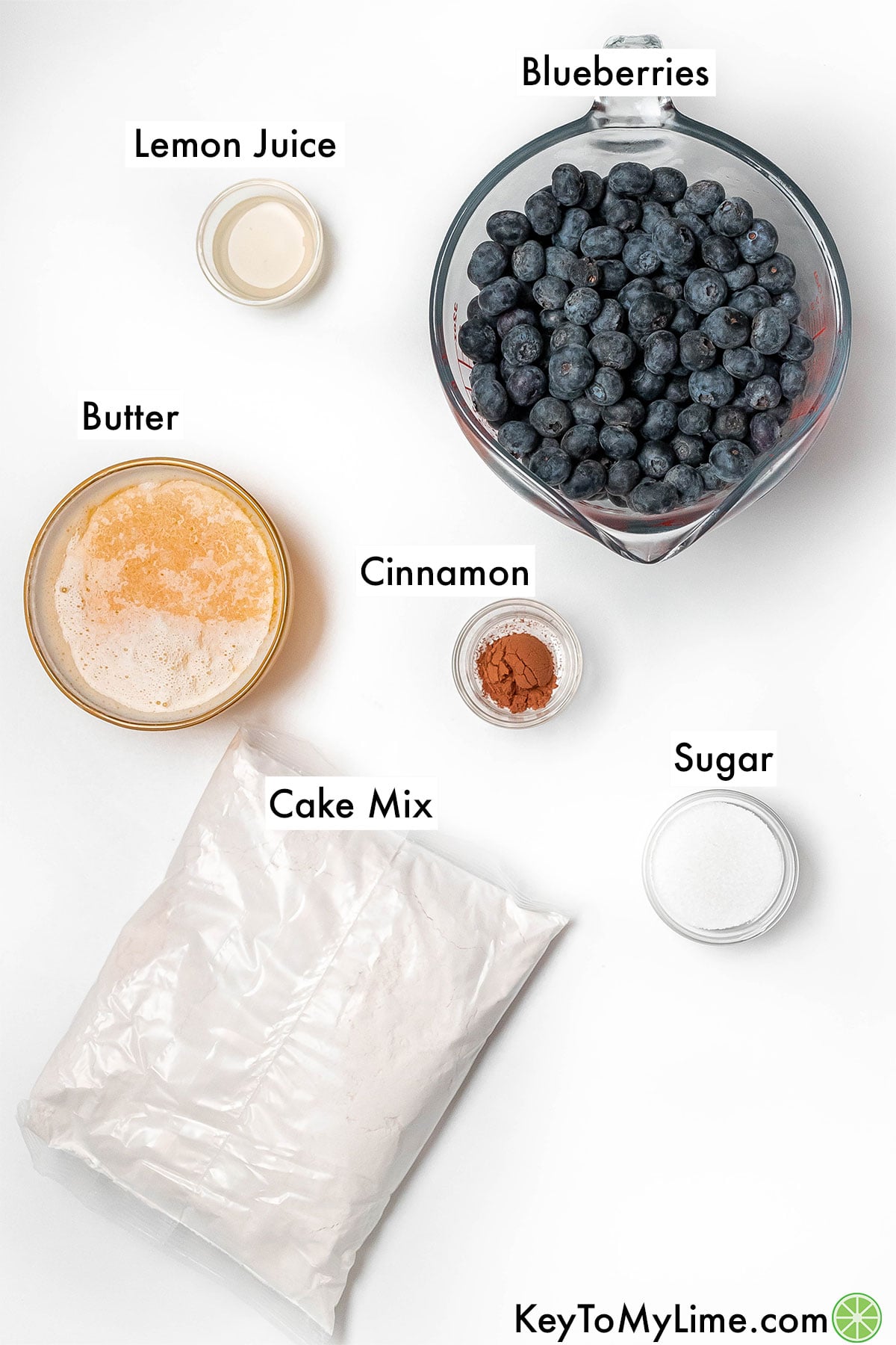 The labeled ingredients for blueberry cobbler with cake mix.