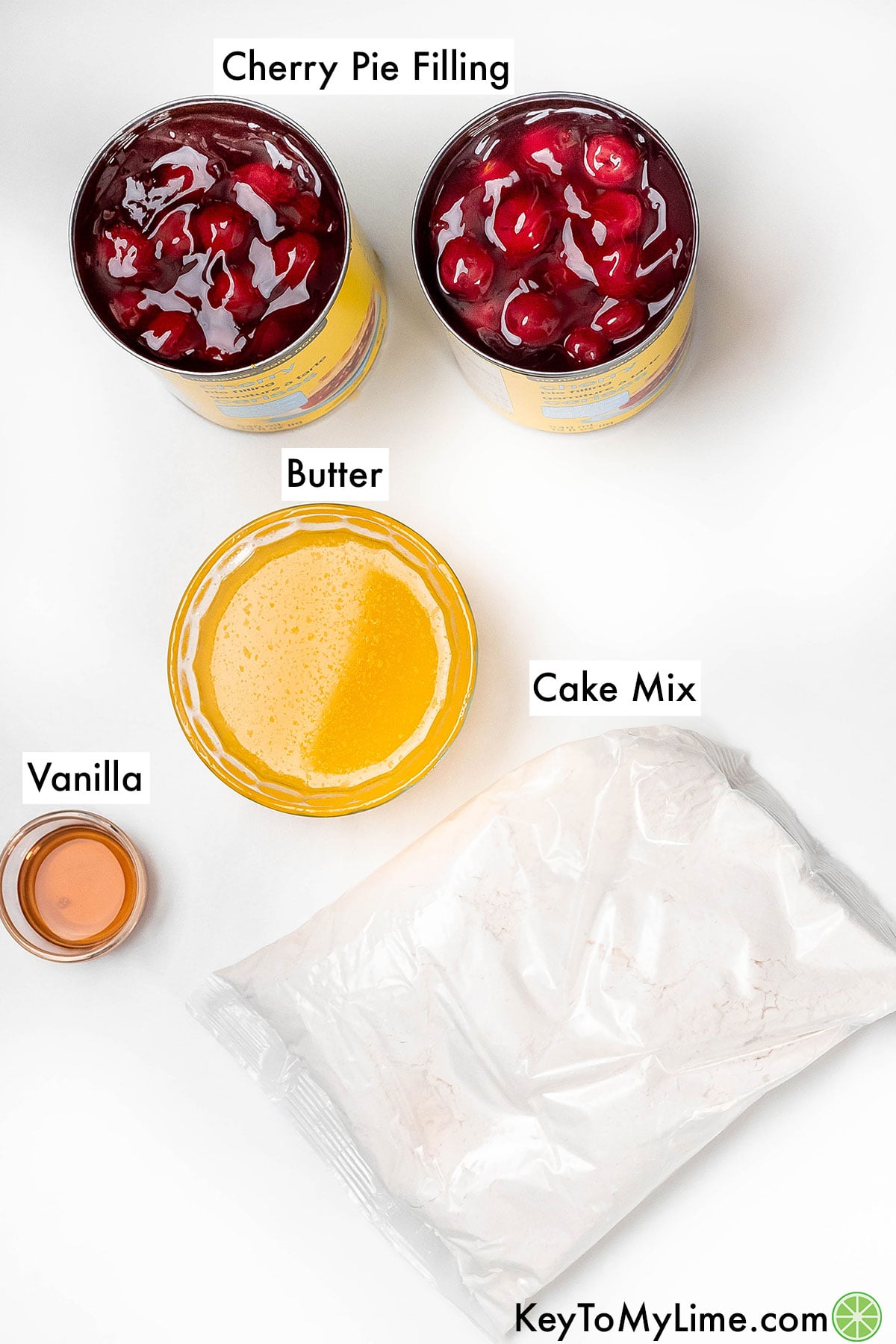 The labeled ingredients for cherry cobbler with cake mix.