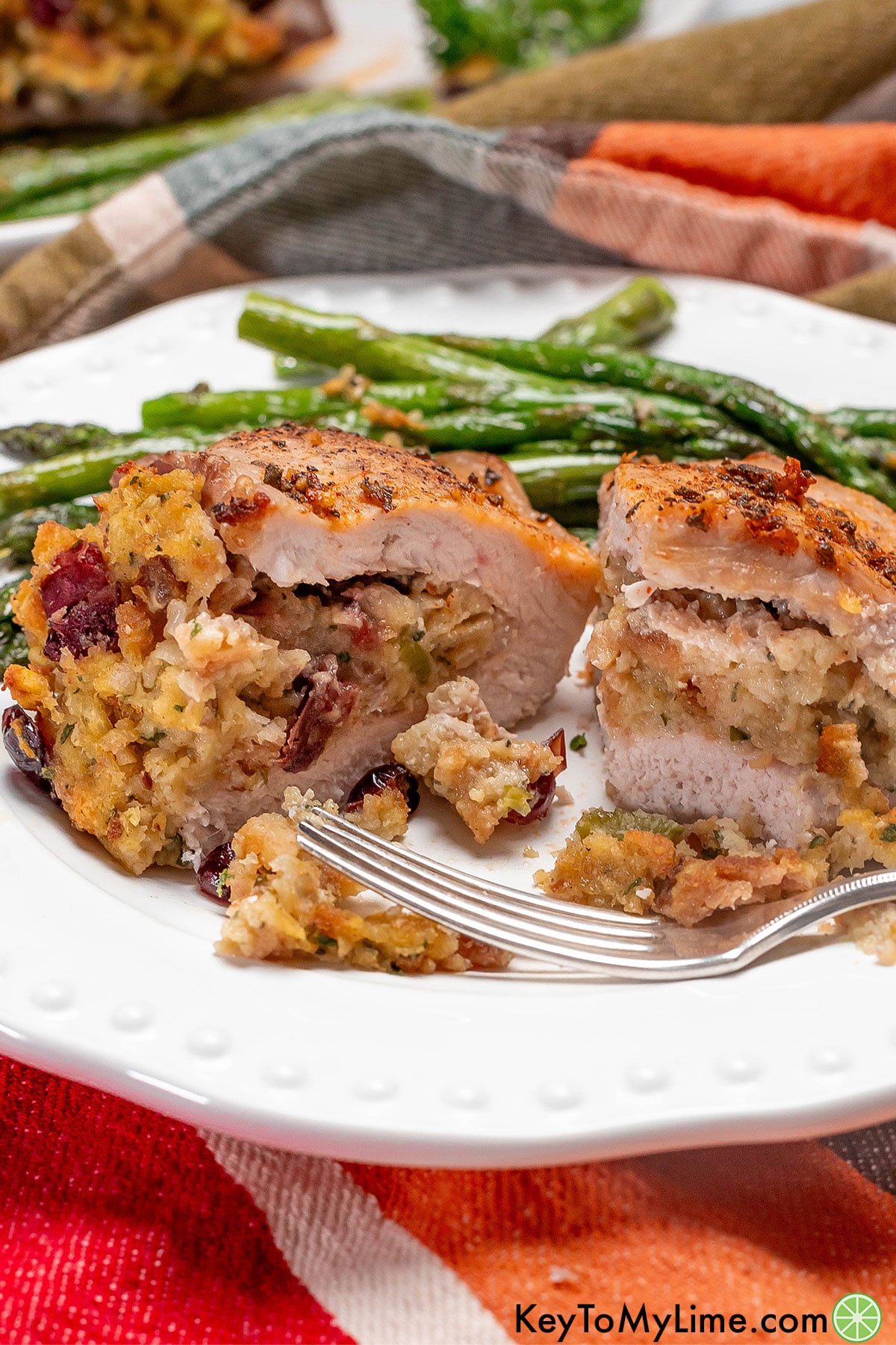 A side image of a sliced pork chop showing the inside stuffing texture.
